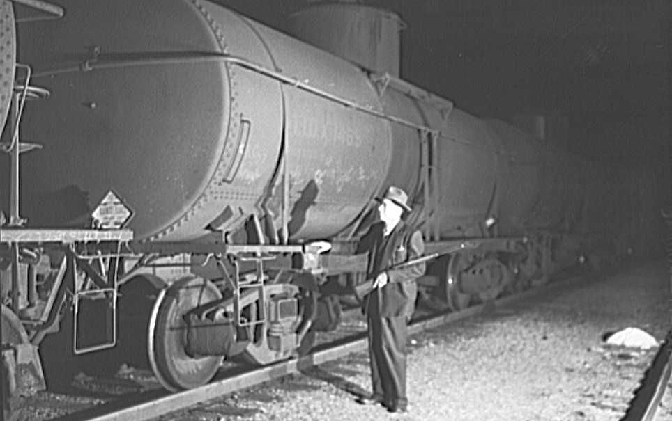Railroad guard in Tulsa., Oklahoma yards  Photo: John Vachon, FSA/Library of Congress