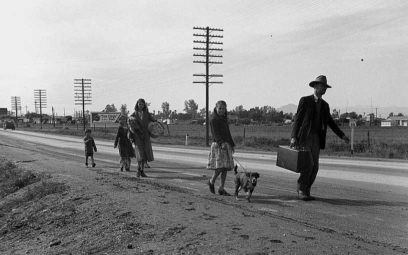 On U.S. 99. Near Brawley, Imperial County. Homeless family of seven  Photo: Dorothea Lange