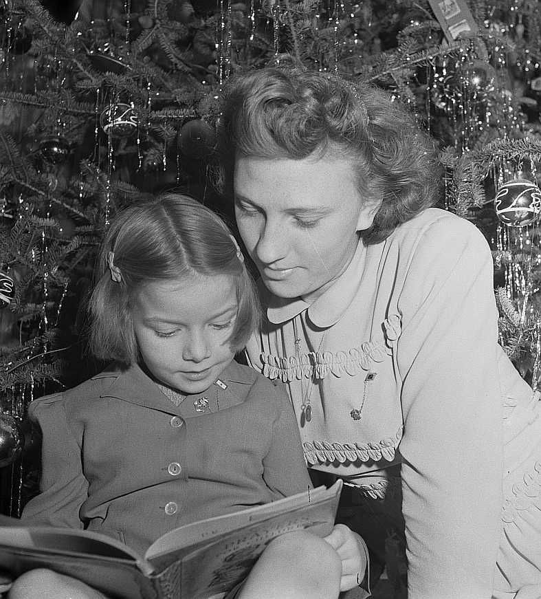 Child and her aunt at the Christmas tree, New York  Photo: Marjory Collins