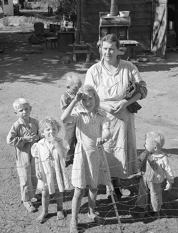 Family living in shacktown community, Yakima, Washington Photo: Dorothea Lange