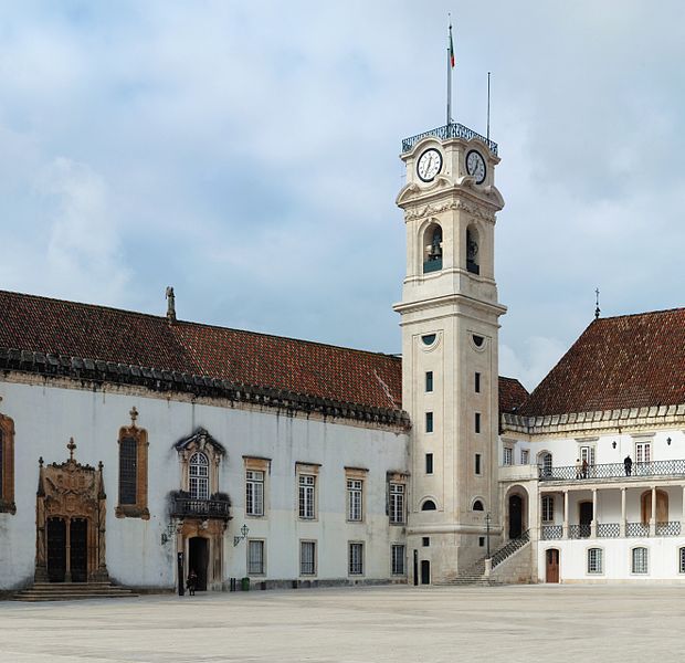 The tower of the University of Coimbra, Portugal. At left, the Manueline door to the Chapel of Saint Michael