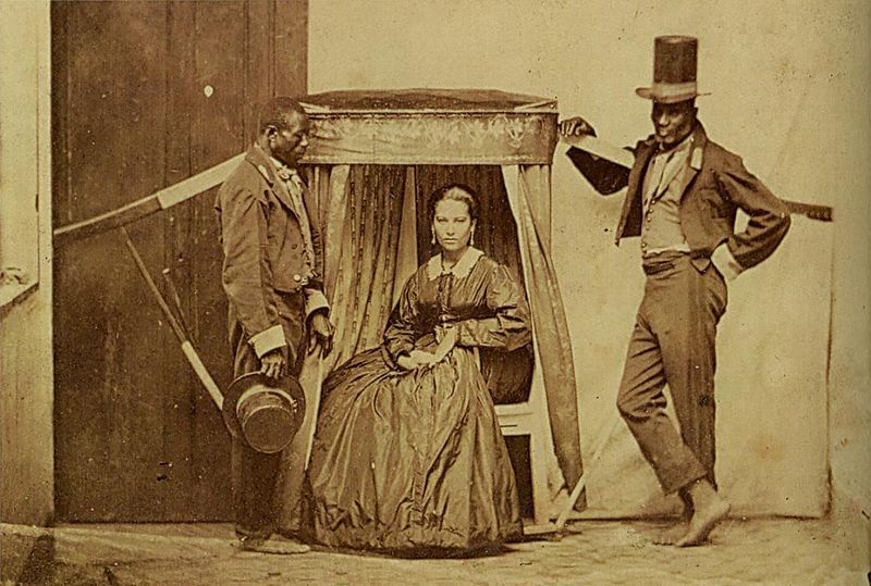 Brazilian lady and her slaves in 1860 - Wikipedia Commons