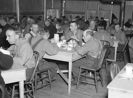 Men in transient camp near Hagerman Lake, Michigan  Photo: Russell Lee