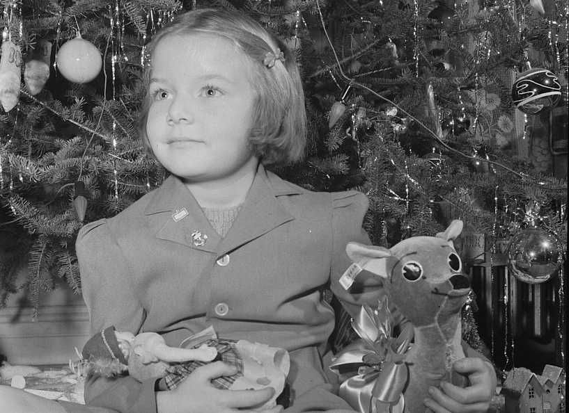 A Child and her Christmas tree