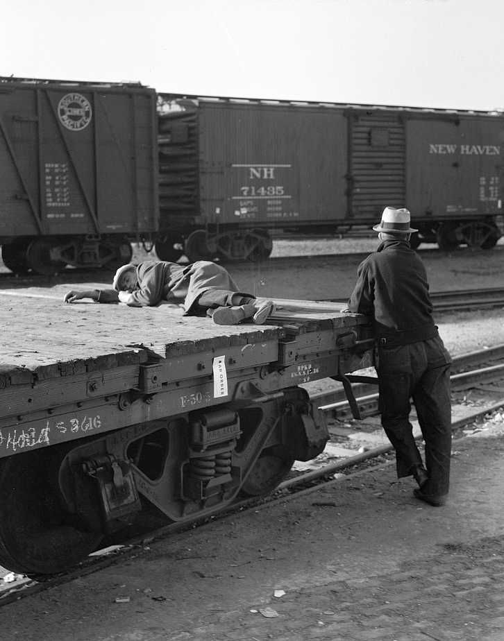 Scene in railroad yard, Sacramento, California   Photo: Dorothea Lange