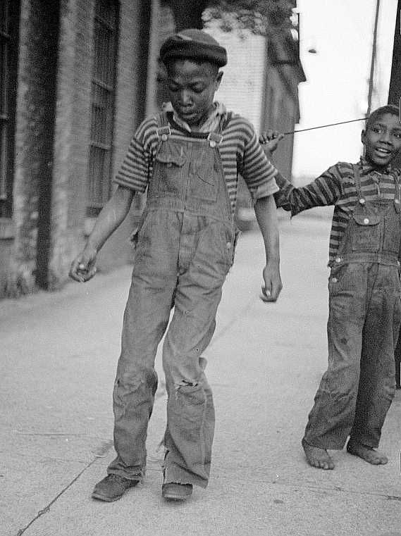 Dancing for arrivals at hotel, price five cents Cairo, Illinois     Photo: John Vachon 