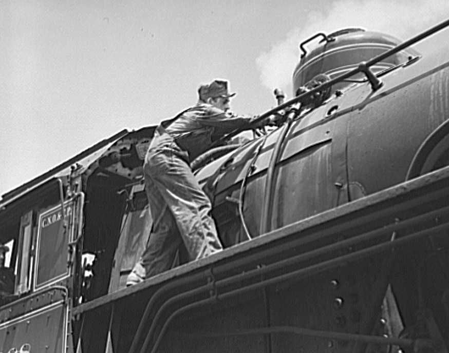 Railroad crews at Watts Bar Dam, Tennessee clearing the sand line is one of the chores that fall to the 