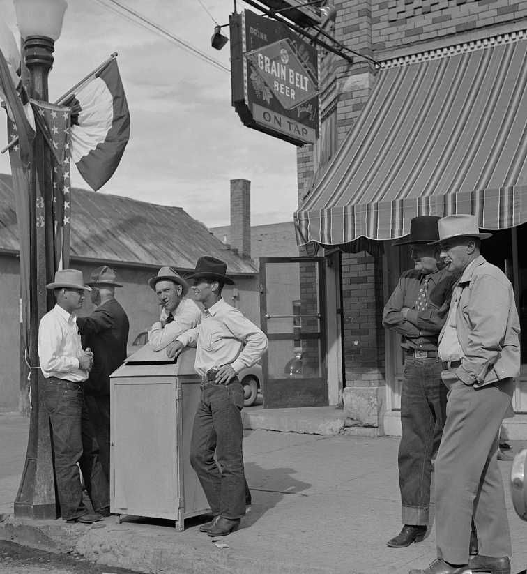 Stockmen on street corner, Sheridan, Wyoming Photo: Marion Post Wolcott